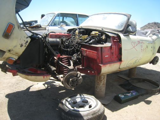 Illustration for article titled Junkyard Jackpot: BMW 2002, Corolla GT-S, Triumph Spitfire